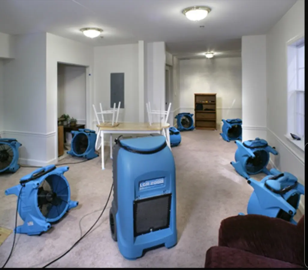 Air movers and dehumidifier setup for Water Damage Restoration in Hartford